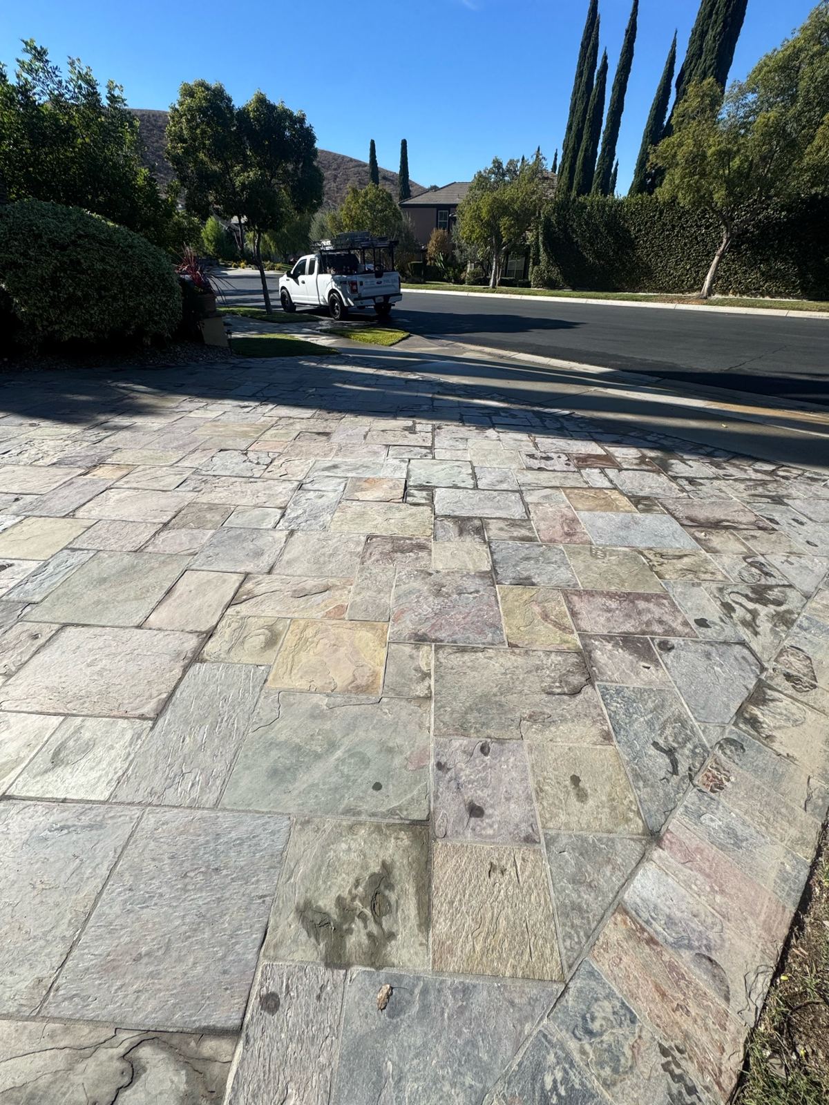 Repaired slate tile driveway seen from the street side